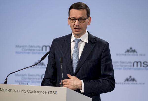 Poland tries to frame PM's Holocaust remarks as frank debate