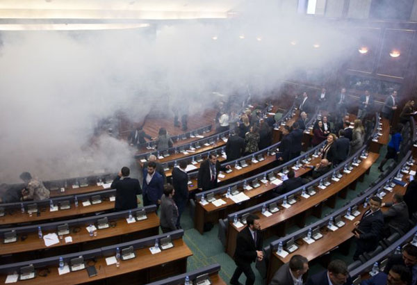 Kosovo parliament vote on border deal halted by tear gas