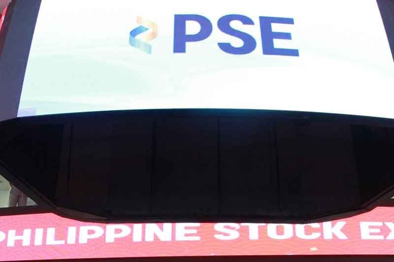 Index ends almost flat after volatile trading