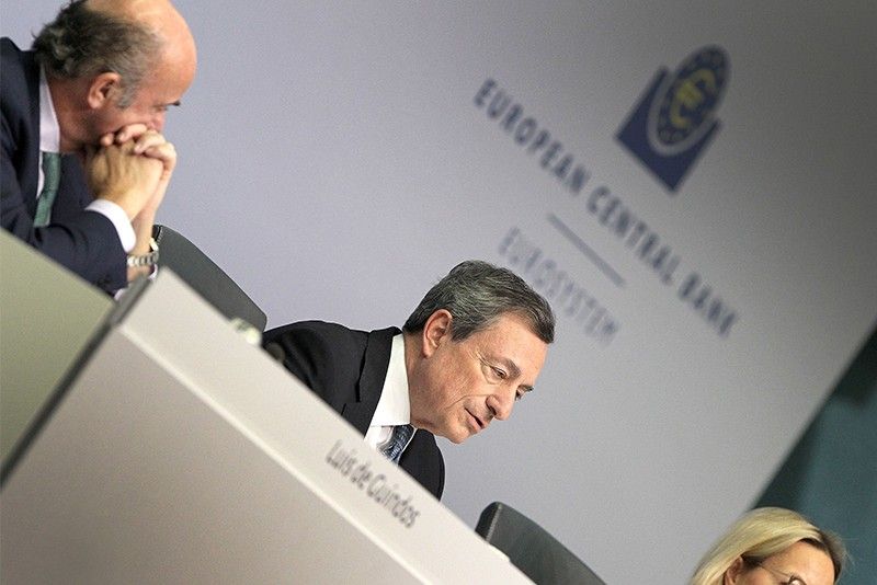 Euro slides as 'downbeat' ECB warns on economy