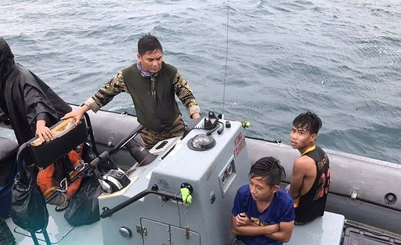 Navy ship rescues 2 teens from capsized banca off Balangiga