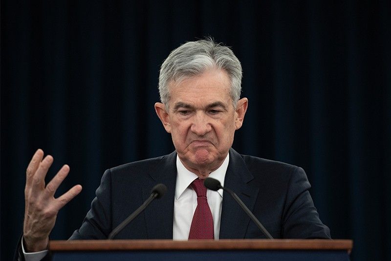 US Federal Reserve raises lending rate, signals slower pace ahead