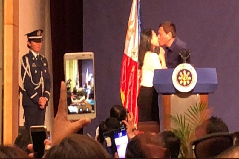 Duterte's public kiss with Filipina in South Korea among Reuters top 2018 stories