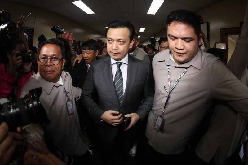 Law 'catching up' with Trillanes, Panelo says