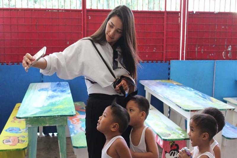 Shay Mitchell visits child care foundation in Manila