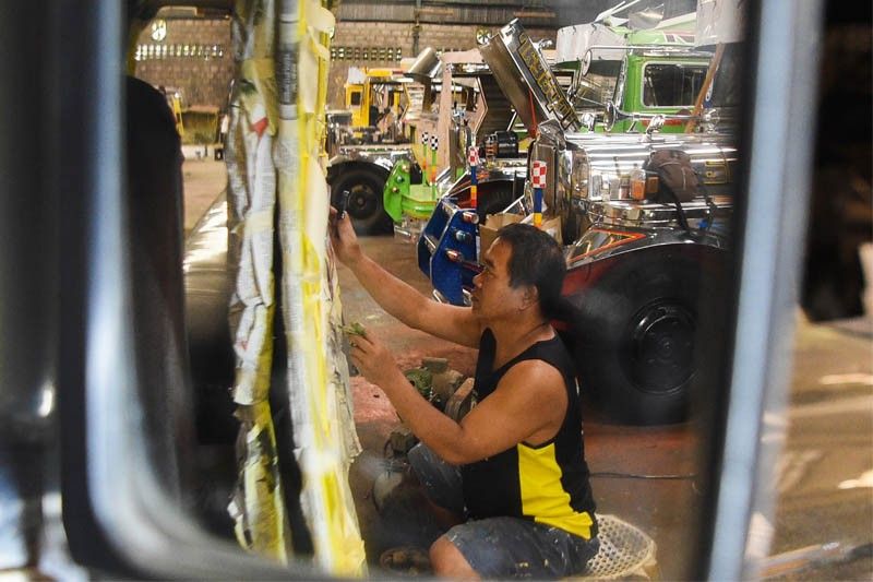 Jeepney artists stalked by extinction