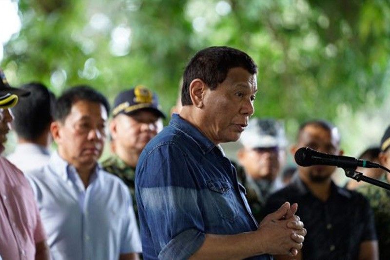 Duterte says he will fire 2 DAR officials