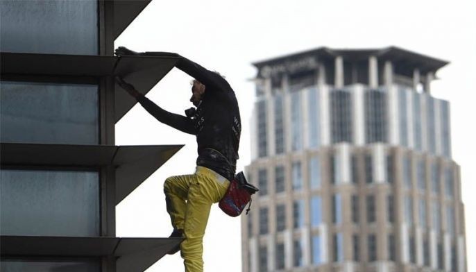 WATCH: 'French Spiderman' Alain Robert arrested after climbing Makati  building 