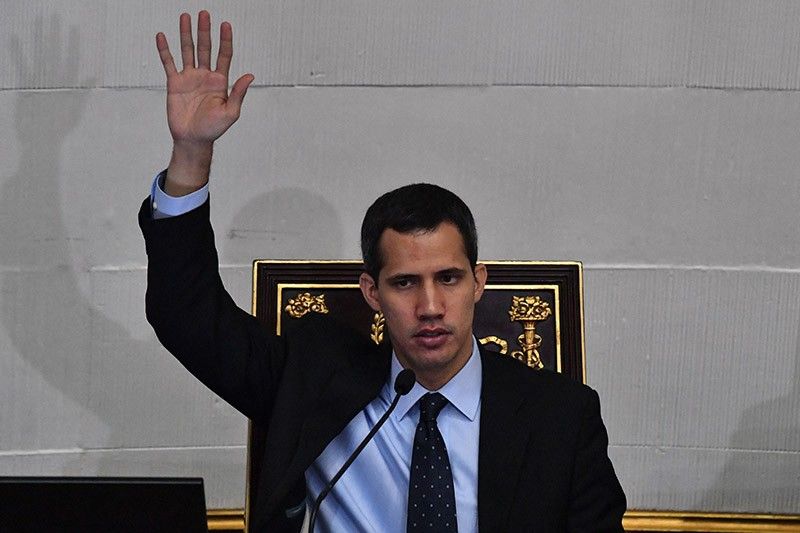 Venezuela's Guaido warns military on blocked aid