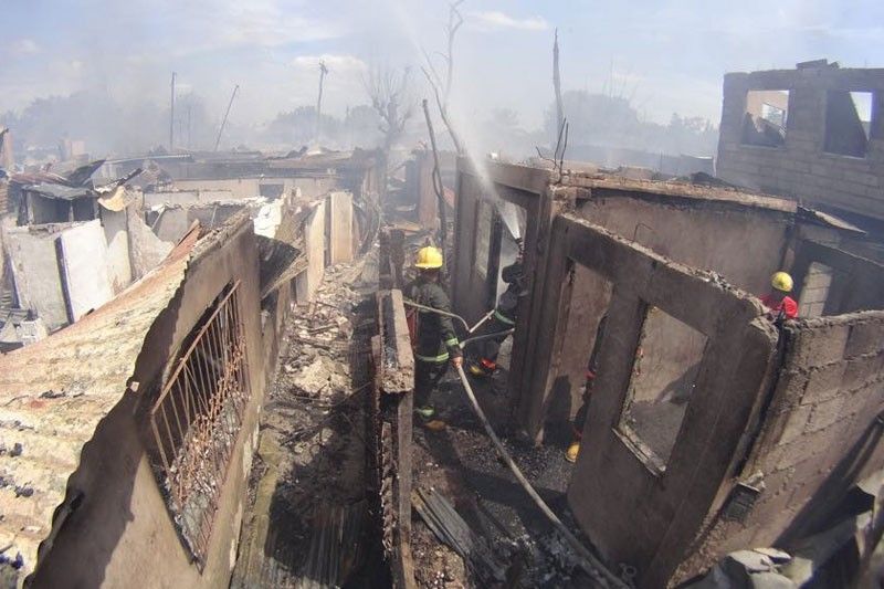 4 hurt, over 100 houses razed by separate fires | The Freeman