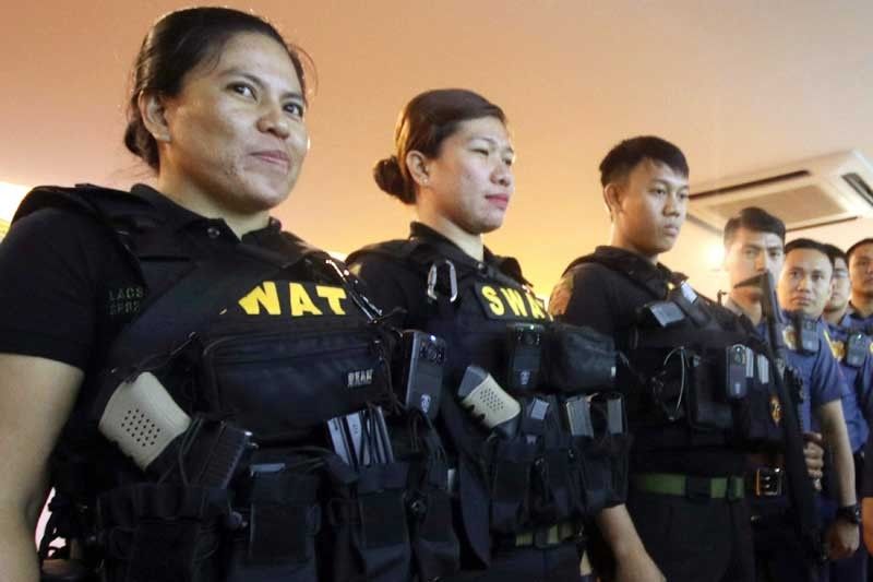 Quezon City Police receives body cameras, handcuffs