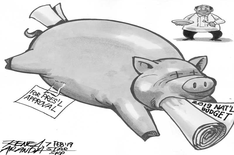 EDITORIAL - Pork-hungry