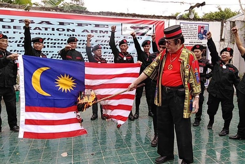 Philippines to look into burning of Malaysian flag