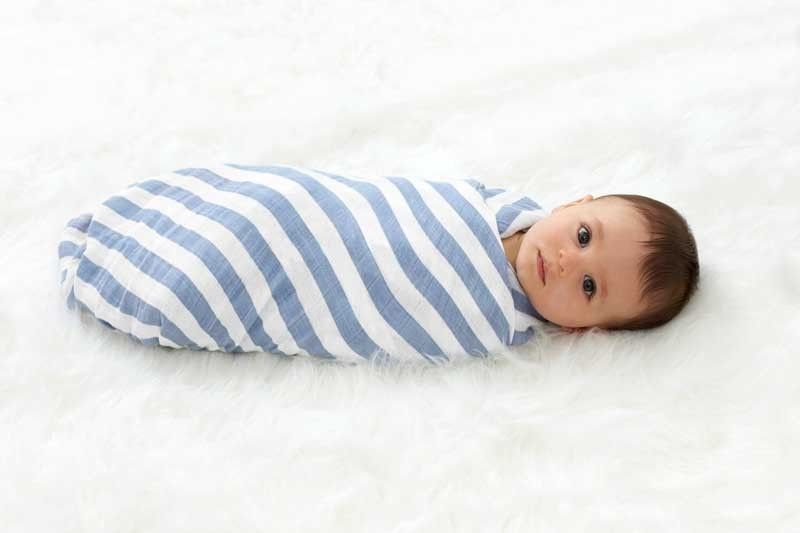How daddies learn to swaddle with care