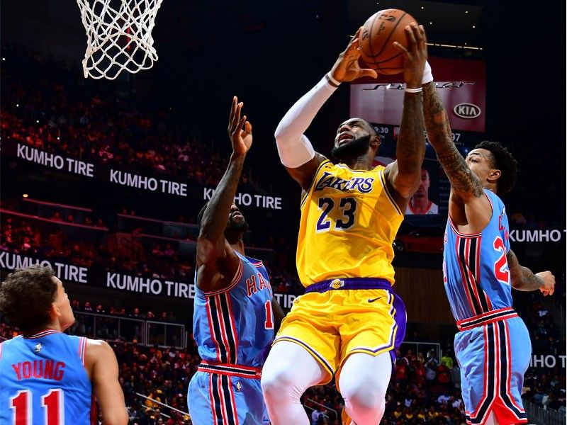 Hawks withstand LeBronâ��s triple-double, beat Lakers