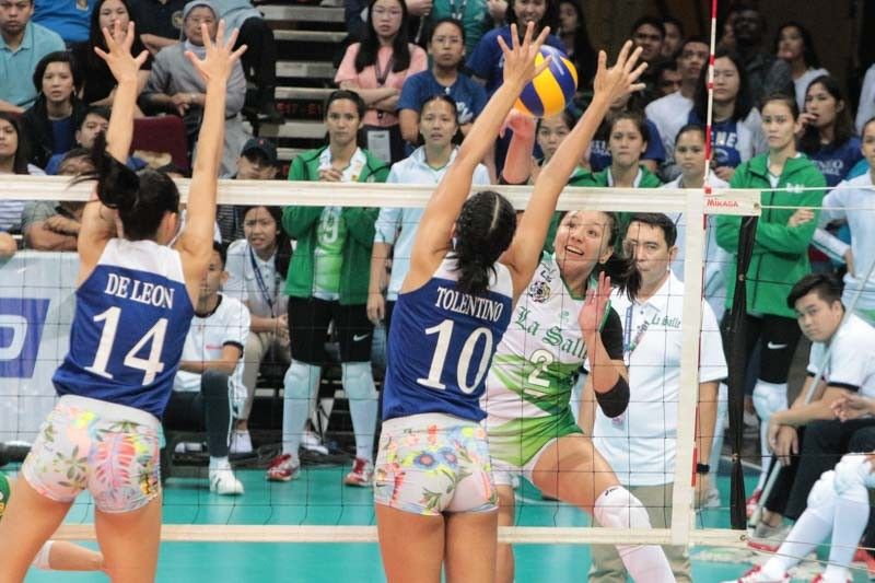 Lady Spikers rain aces on Lady Eagles in four-set win