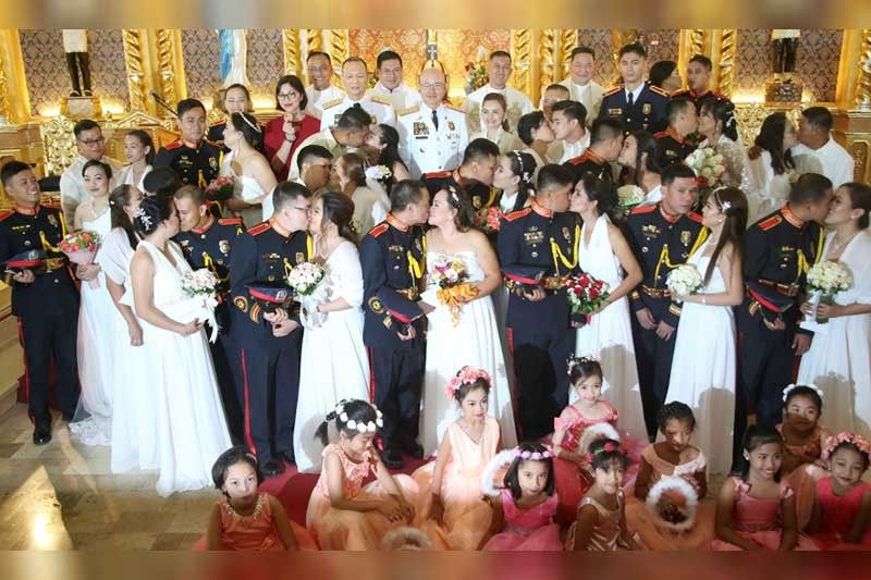 19 couples exchange vows in PNP mass wedding