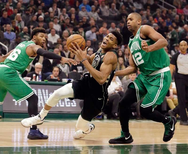 NBA-leading Bucks stop stubborn Celtics