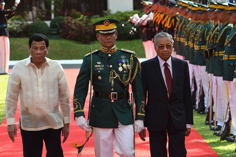 Mahathir denies Philippines' claim on Sabah, Palace counters