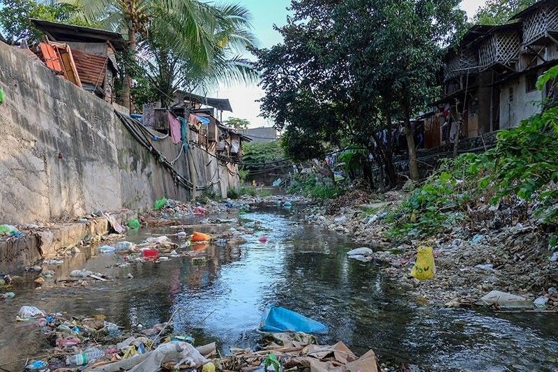 Along Bulacao River 100 households lack septic tanks