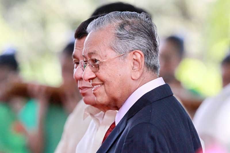 Palace to look into Mahathirâ��s warning on Chinese loans