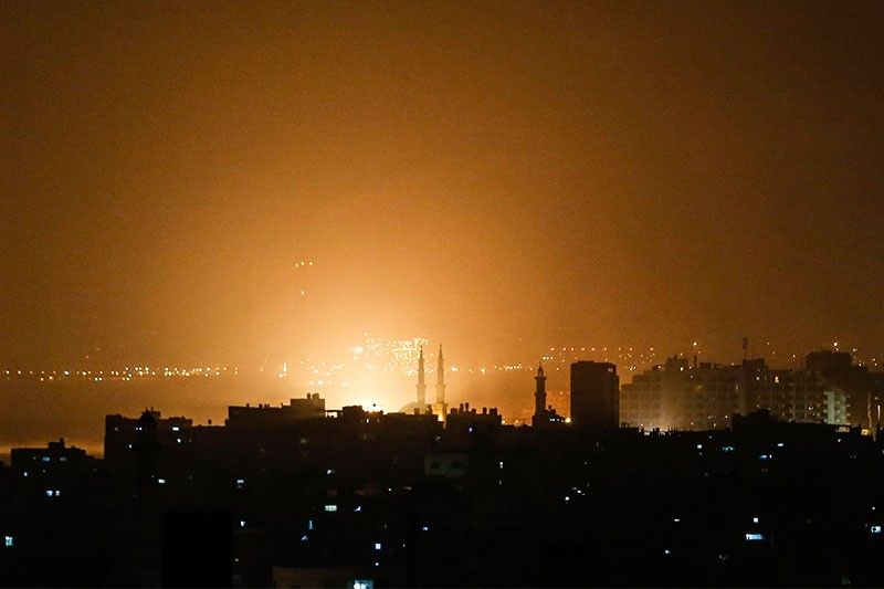 Israel in dozens of strikes on Gaza after rockets target Tel Aviv