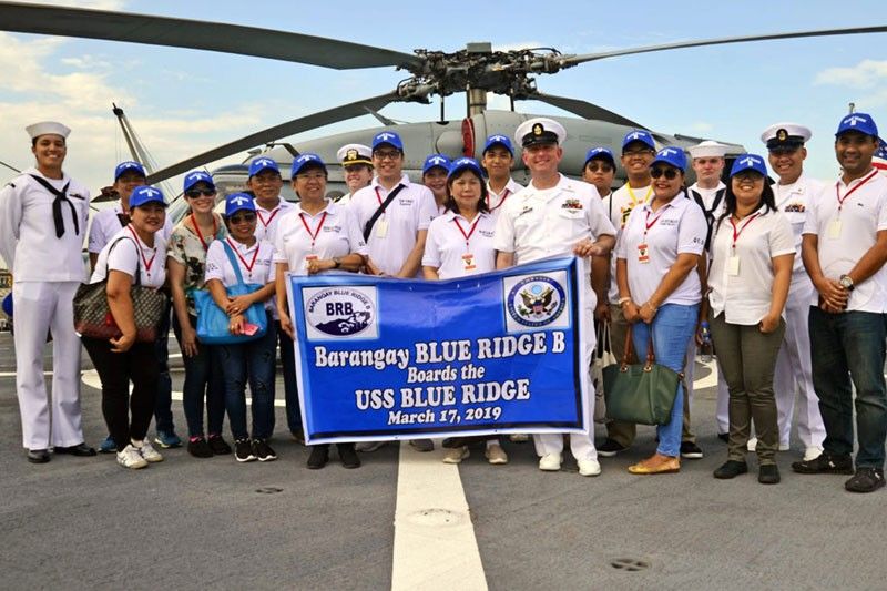 Quezon City residents  tour USS Blue Ridge