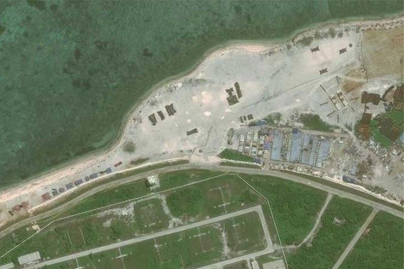 China to develop 'island city' in South China Sea â�� report