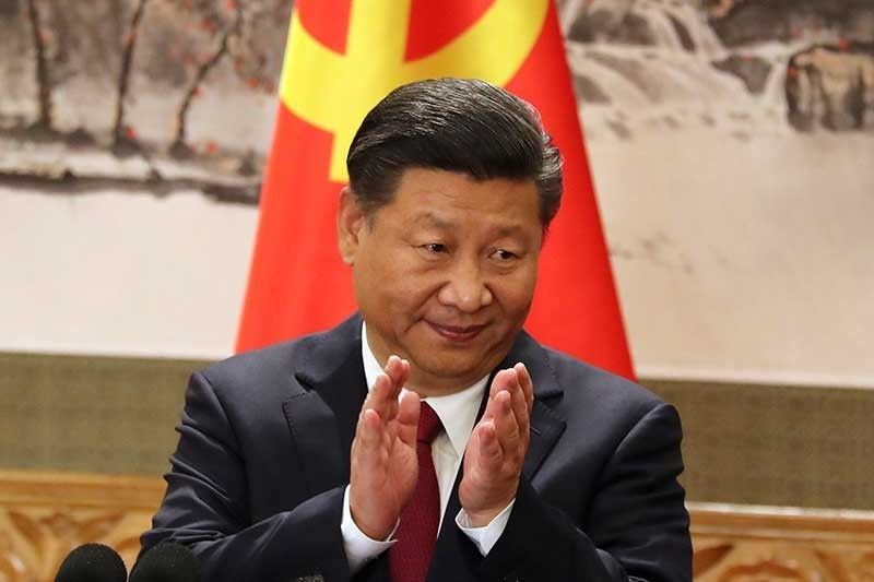 Former gov't officials bring Xi Jinping to ICC
