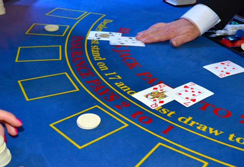 Cop arrested for tearing casino game cards