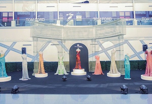 Catriona Gray's Miss Universe, Miss World gowns on display in a mall