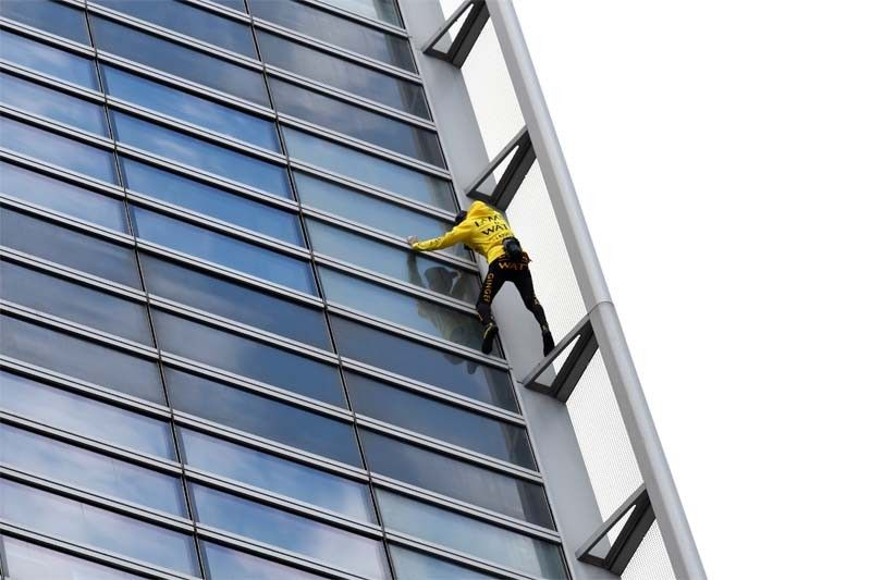 WATCH: French 'Spiderman' climbs Paris tower to "save Notre Dame"