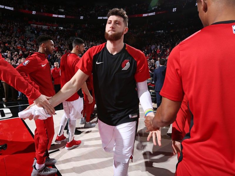 Nurkic horror injury mars Blazers' OT win vs Nets