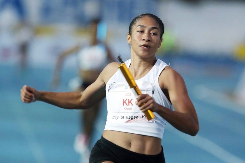 Knott tops 200m sprint in Singapore T/F