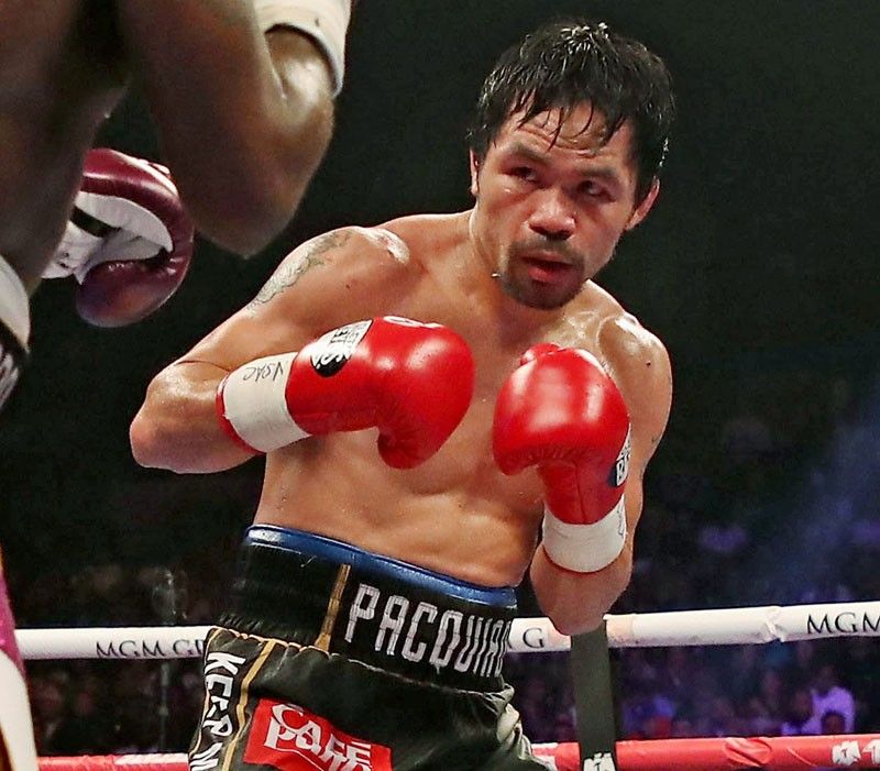 Pacquiao mum over pending Paradigm lawsuit