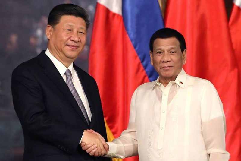China just wants to be friends with Philippines â�� Duterte