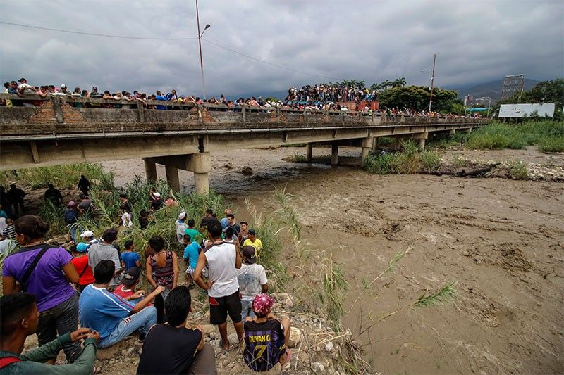 Rich and poor united in desperate quest for water in Venezuela