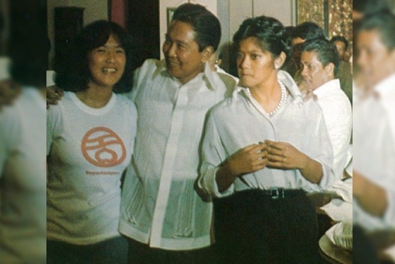 Imee Marcos (right) shares a light moment with her father, Ferdinand Marcos, and sist...