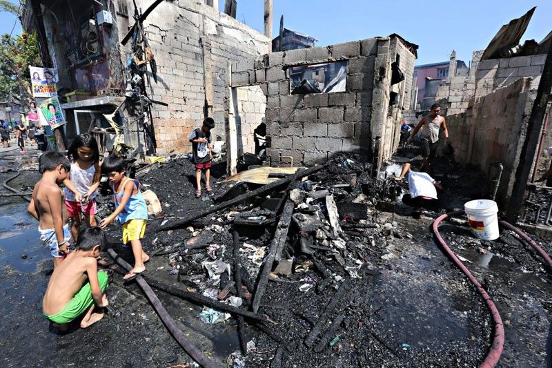 Fire leaves 100 Quezon City families homeless