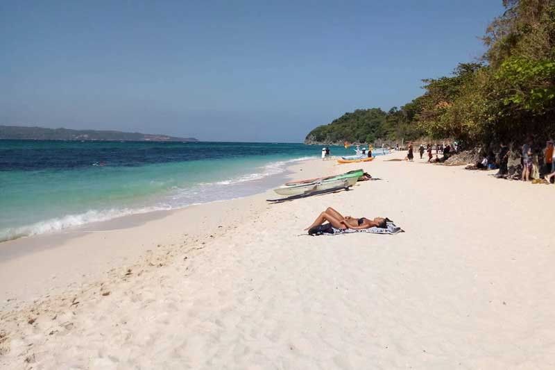 Business booming in Boracay, DOT chief says