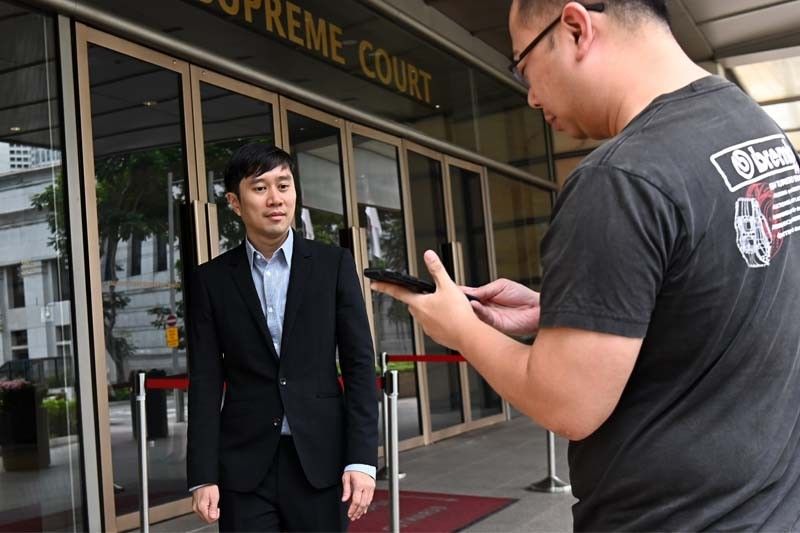 Singapore activist fined for Facebook post on courts