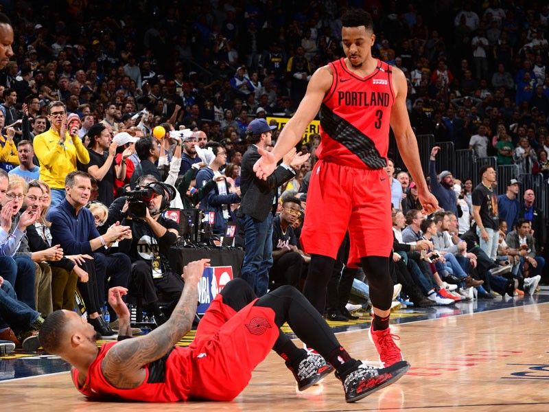 Blazers hold off Nuggets to level playoff series
