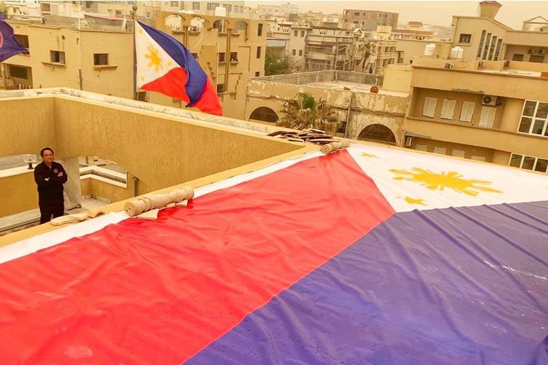 Philippine Embassy in Libya places flag on rooftop for protection on airstrikes