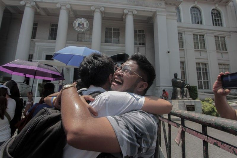Cheers and tears: A look at moments during release of 2018 bar exam results