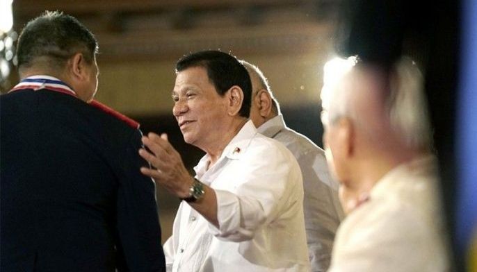 Satisfaction with Duterte admin climbs to fresh record high in Q1 &mdash; SWS