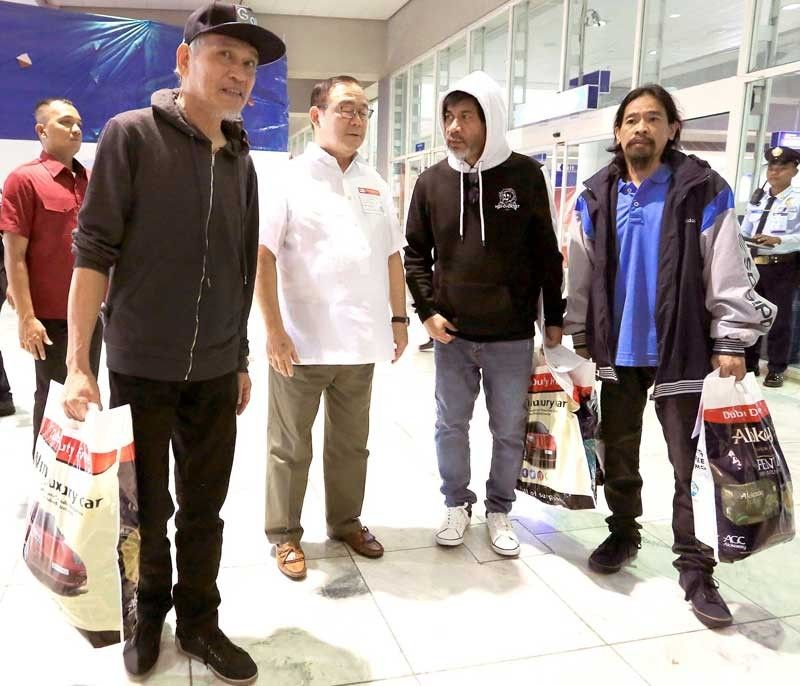 Pinoys taken hostage in Libya back in Philippines