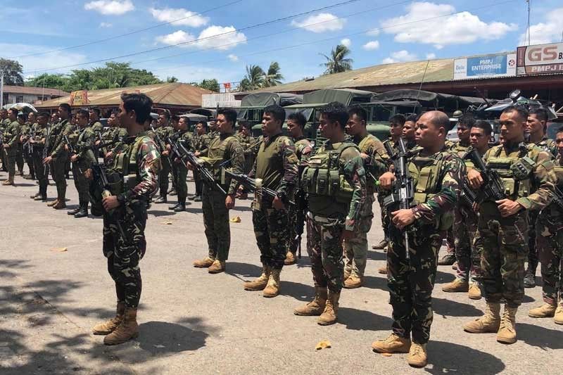 Cops, soldiers to remain in Negros town