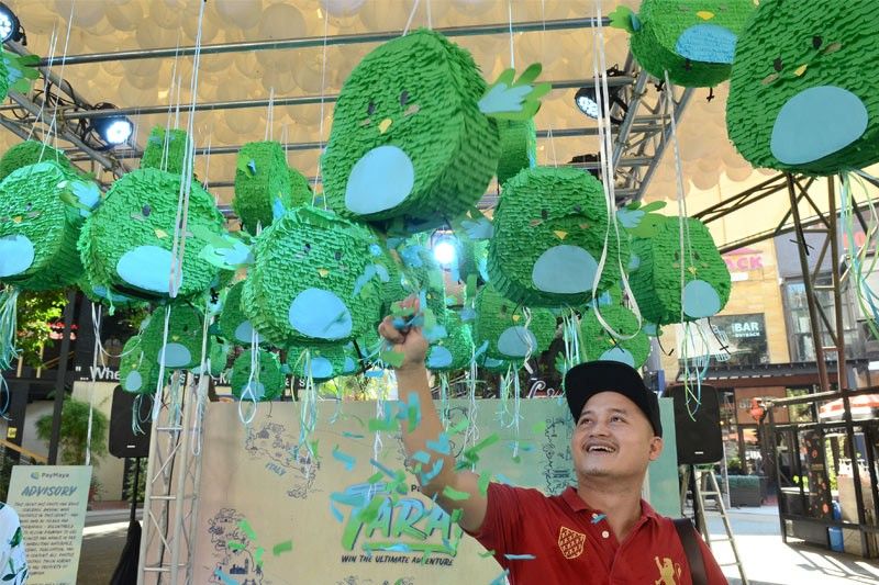 PayMaya surprises Eastwood mall-goers with exciting travel prizes