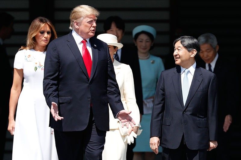 Trump becomes first foreign leader to meet Japan's new emperor