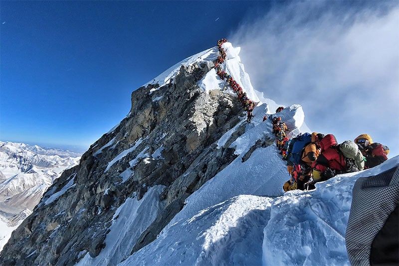 Everest 'traffic jam' survivor calls for tougher rules